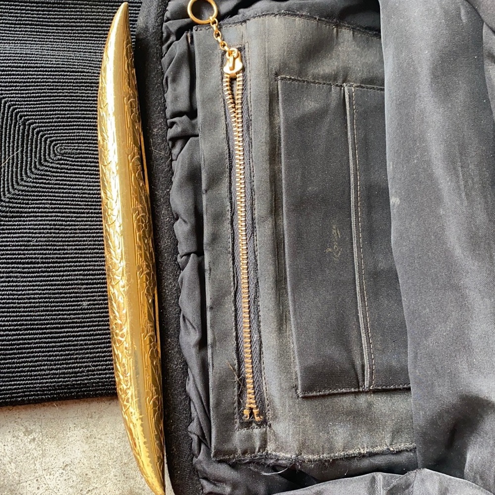 gorgeous 1940s clutch with brass detail